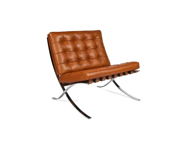 The Barcelona style lounge chair in cognac leather, seen from the front corner