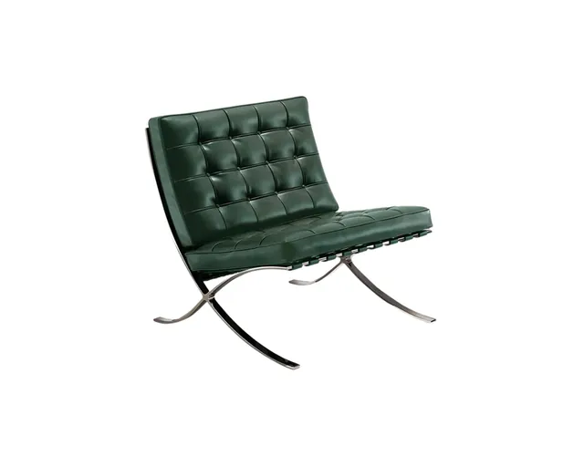 The Barcelona style lounge chair in green leather, seen from the front corner