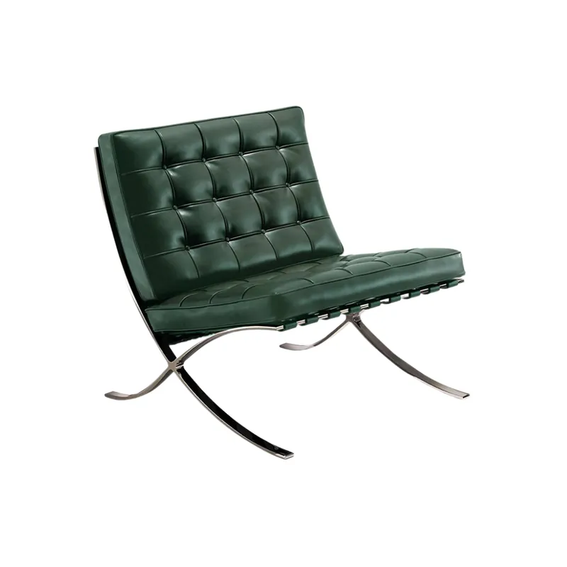 The Barcelona style lounge chair in green leather, seen from the front corner