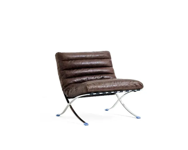 The ribbed lounge chair in brown, seen from the front corner