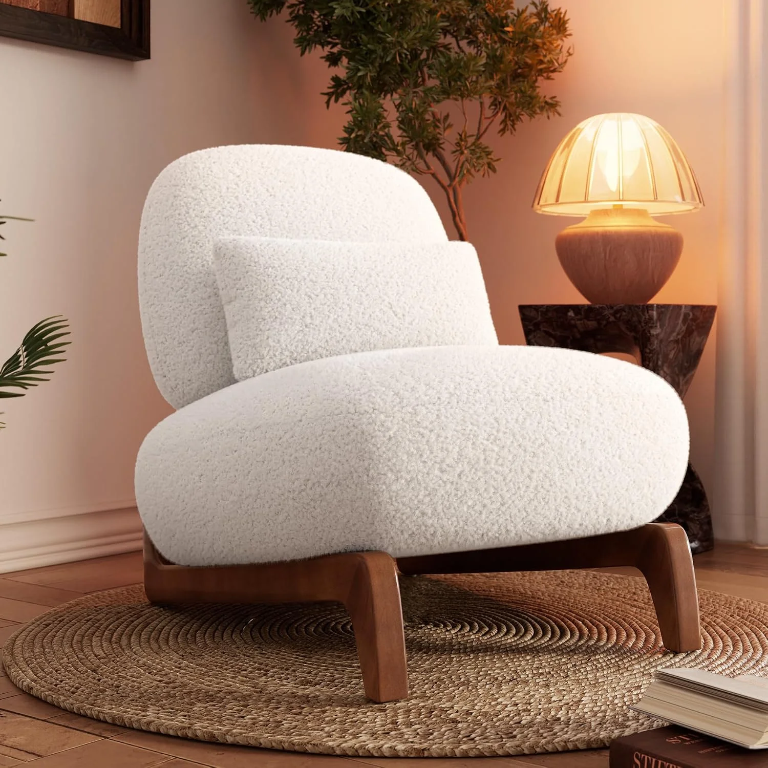 Cloud bouclé chair in off-white with a tilted back and lumbar pillow