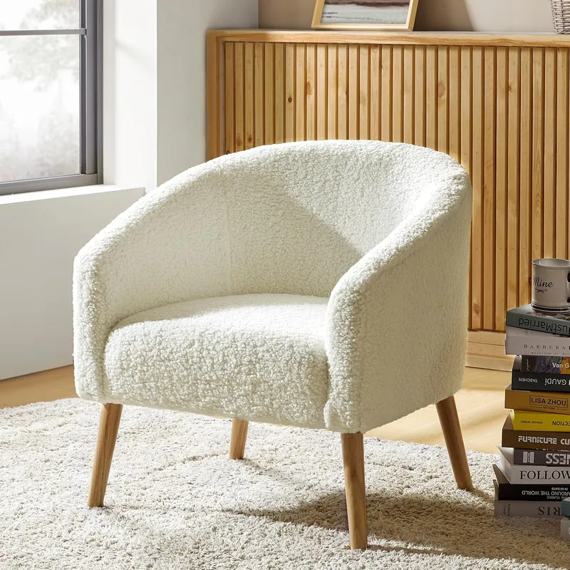 Single ivory bouclé barrel accent chair with wooden legs