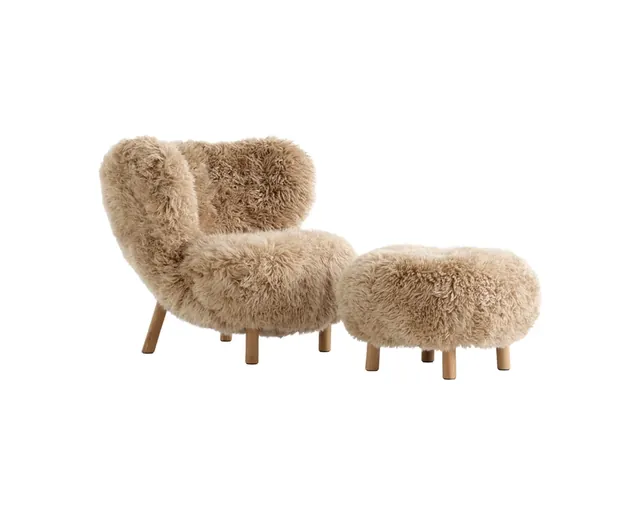 The long-wool sheepskin chair & ottoman in honey