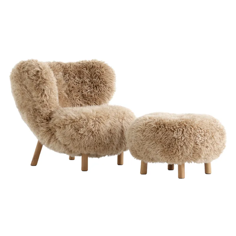 The long-wool sheepskin chair & ottoman in honey