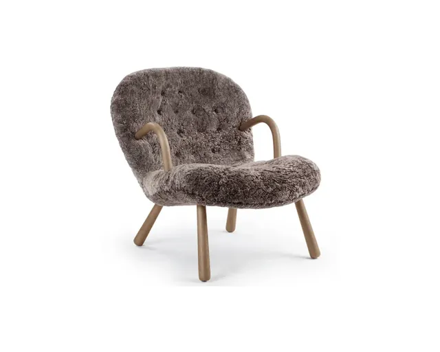 The sheepskin curl-arm accent chair in brown