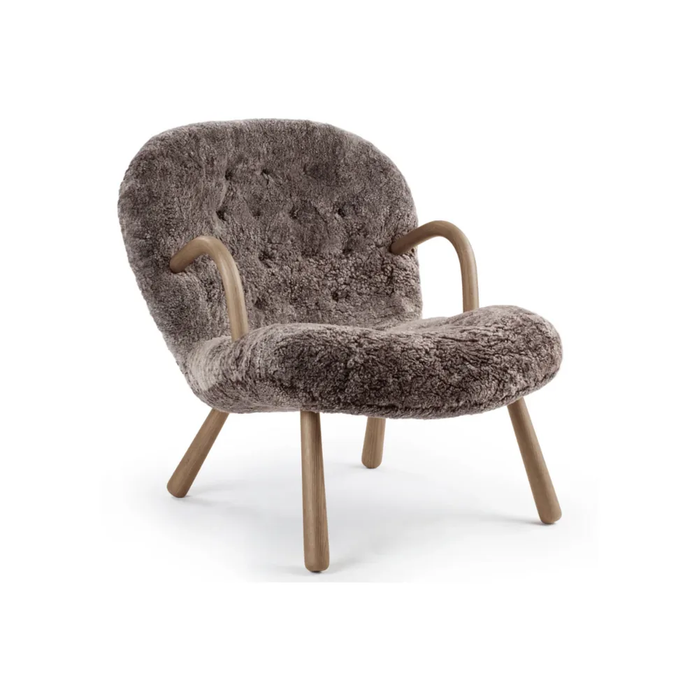 The sheepskin curl-arm accent chair in brown