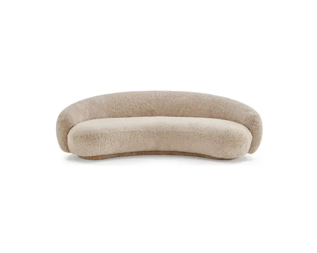 The sheepskin curved sofa in camel