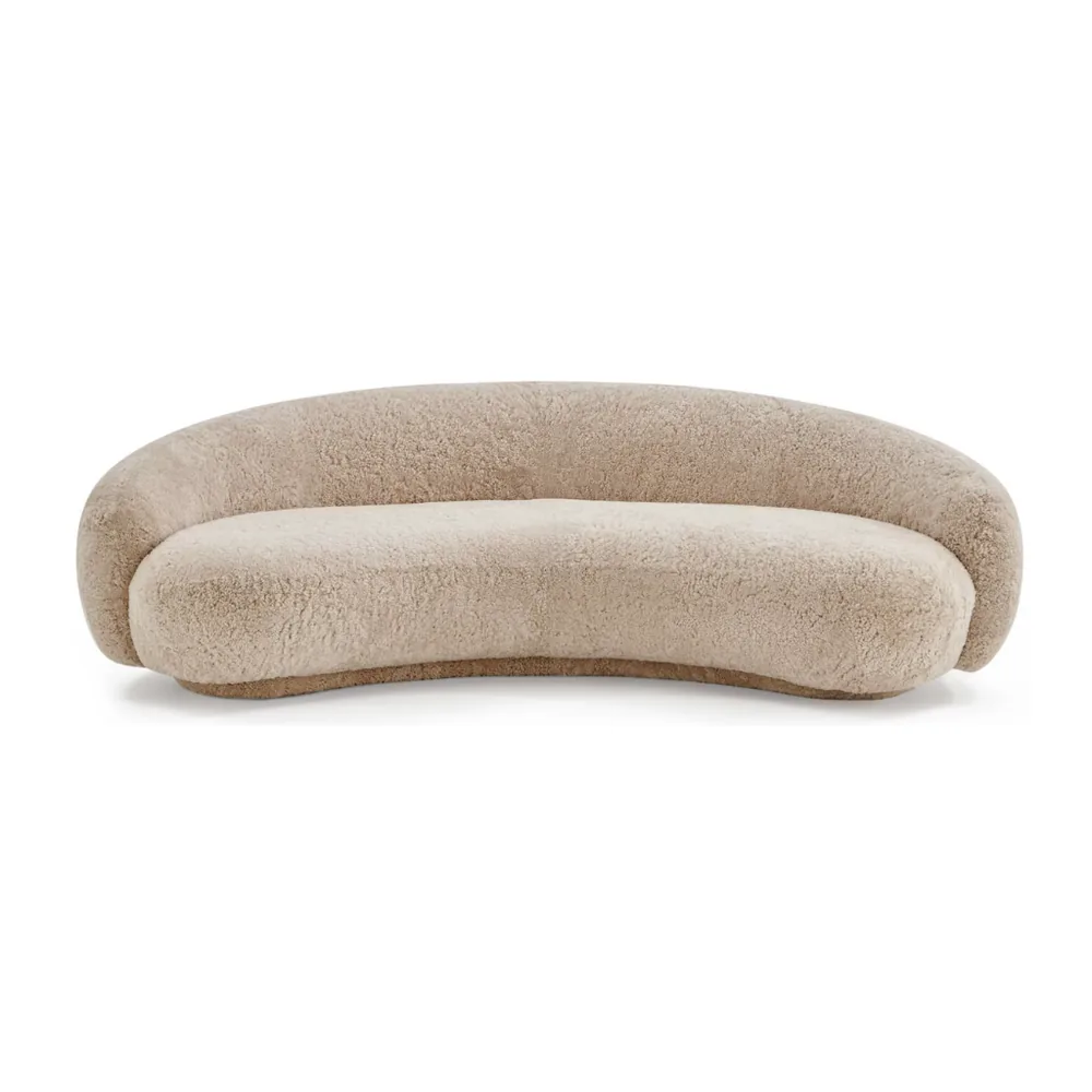The sheepskin curved sofa in camel