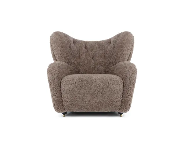 The sheepskin wing armchair in brown